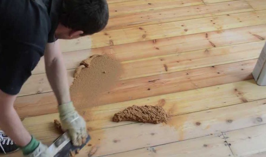 Sanded Wood Dust in Floorboards
