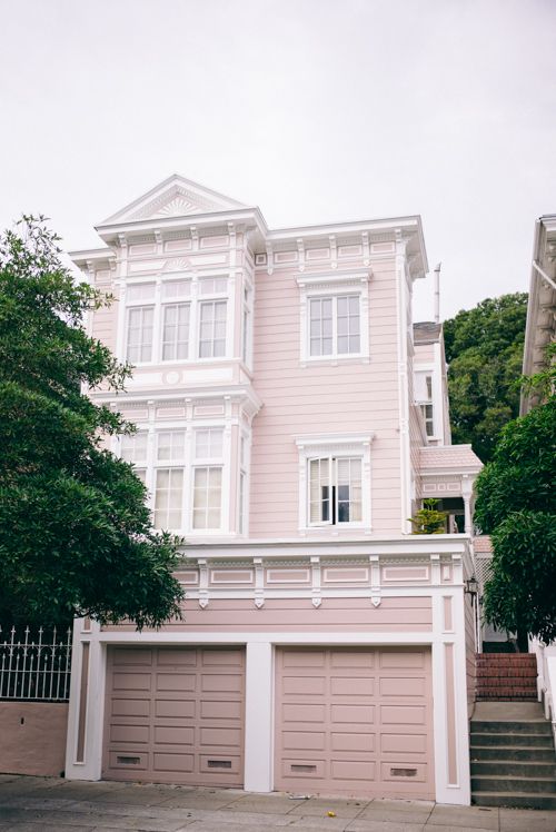 White Stucco House with Blush Pink