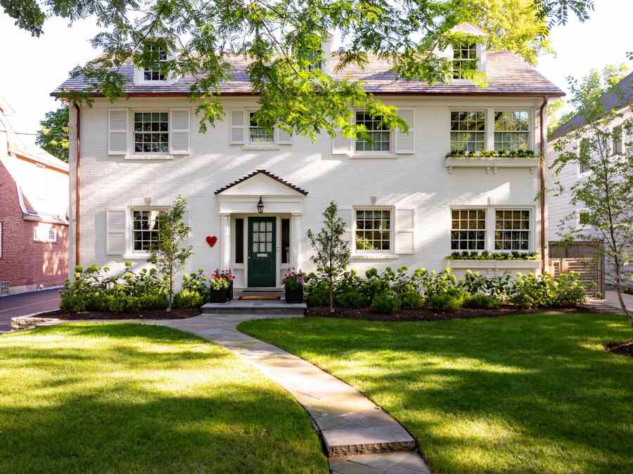 White Stucco House with Soft Taupe