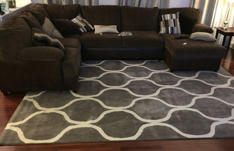 Matching Layered Rugs With Dark Brown Couch