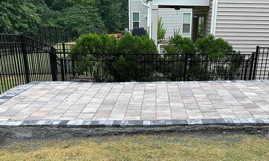 Raised Paver Patio Design for Uneven Surface