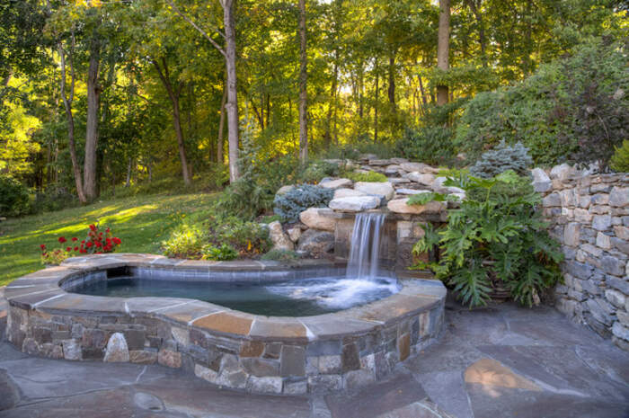 Using Natural Stone for a Zen-Like Feel Above Ground Spa
